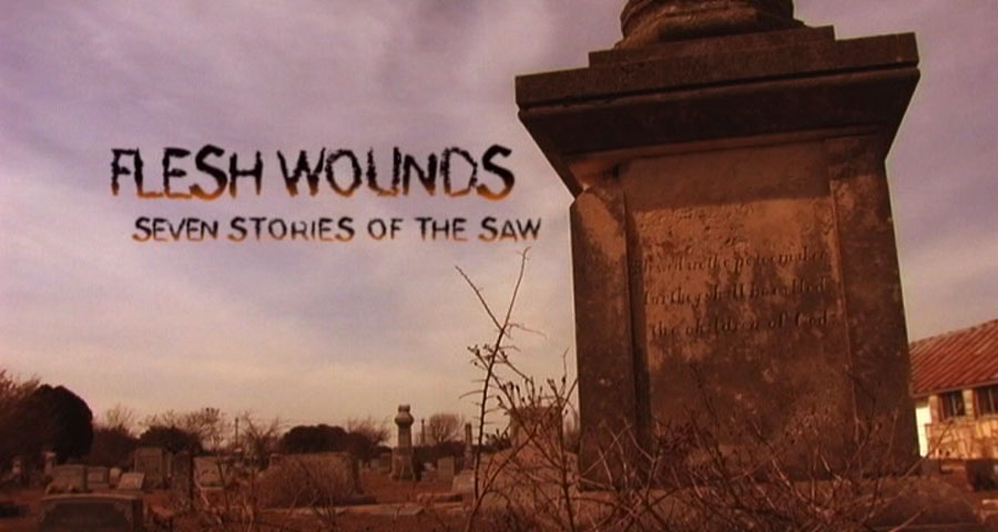 Title card to "Flesh Wounds: Seven Stories of the Saw"