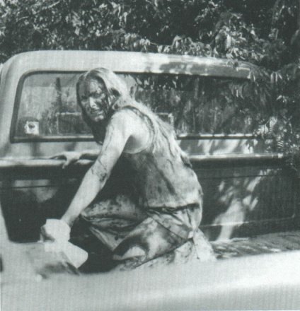 Marilyn Burns in the back of the truck.