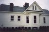 The left side of the house.  The dining room window.