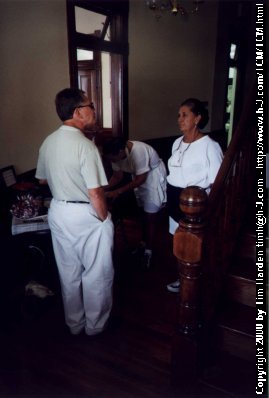 Allen Danziger talking with the owner of the house, Norita.